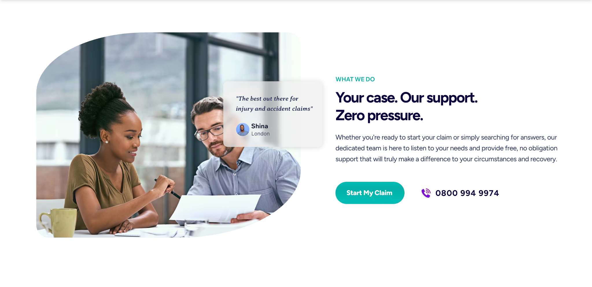 A claims adviser talking through paperwork with a client